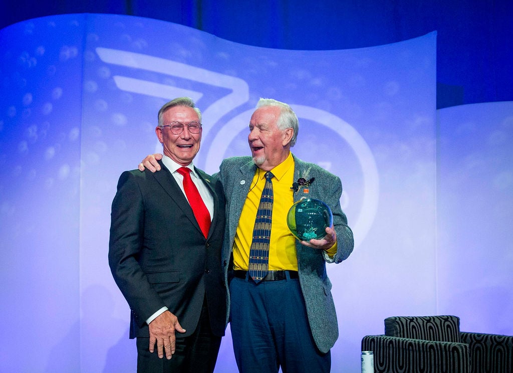 Jay Westman from Jayman Built presents the award to Mogens Smed