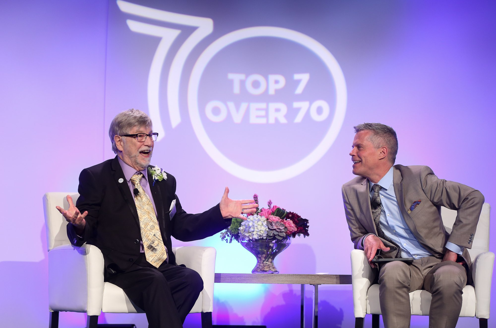 Louis B. Hobson and gala emcee Dave Kelly share a laugh.